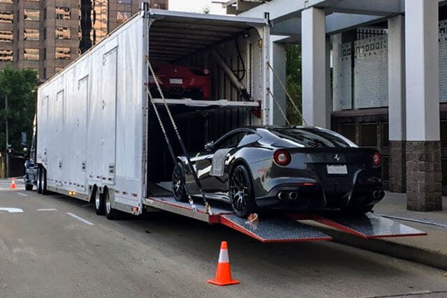 Luxury Car Being Loaded on Enclosed Trailer | National Transport Services