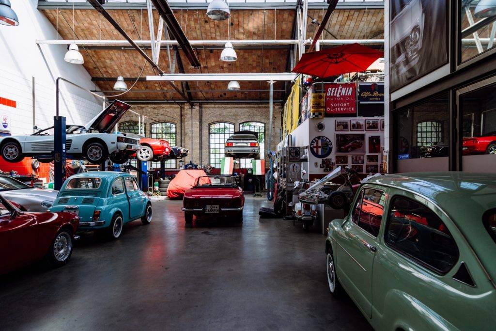 A view from inside a classic car shop. Want to find collectible cars? Whether looking for muscle cars or a classic car enthusiast, this blog post will help you start your search.