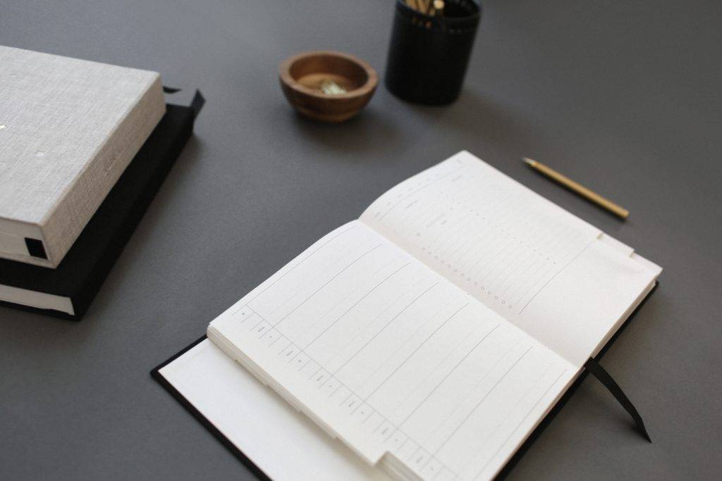 An empty agenda notebook. cheapest auto shipping