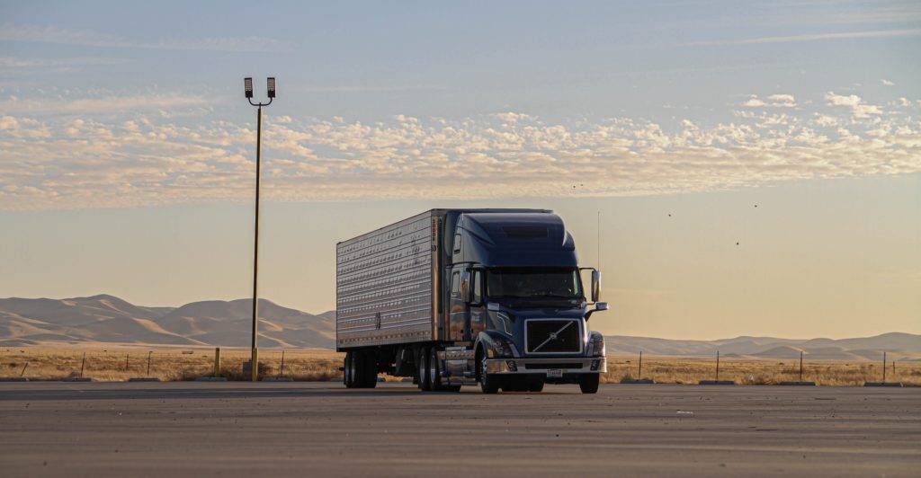 Semi truck with enclosed trailer. Enclosed Auto Transport