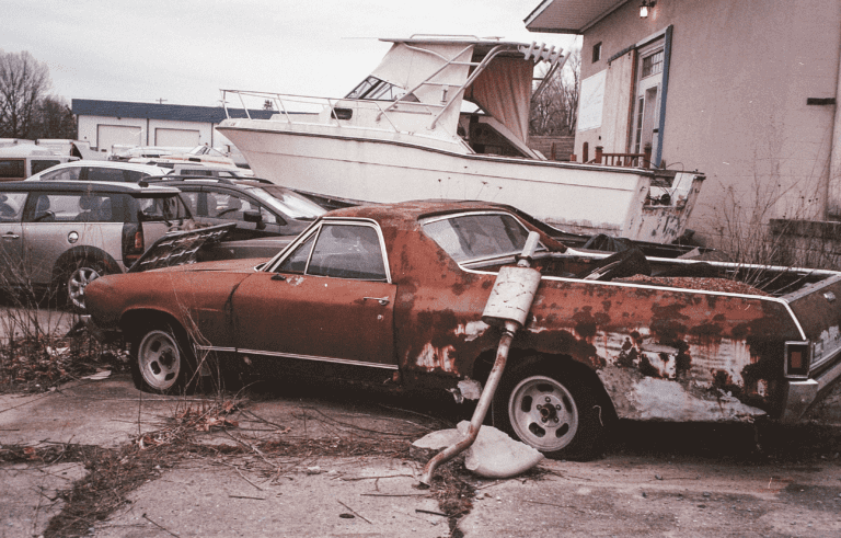 A rusty non-running Chevrolet El Camino with flat tires. We always recommend having an auto insurance policy for your vehicle. CHEAPEST WAY TO SHIP A CAR